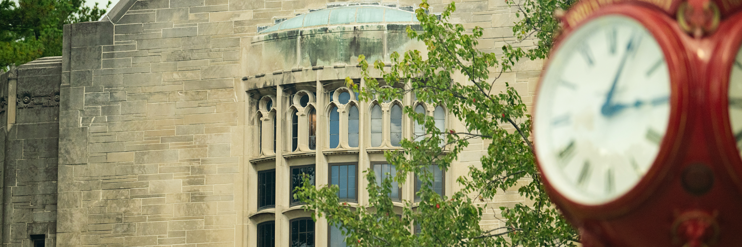 Clock in front of building