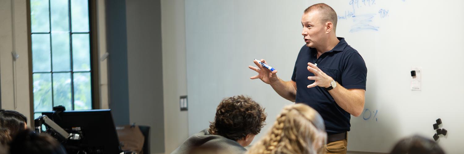 Professor speaking to students